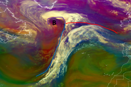 Figure 2 : Dépression des moyennes latitudes (aussi appelée cyclone extratropical) dans l’Atlantique Nord. Le centre au sud du Groenland est marqué par un B, la ligne violette représente le front occlus, la bleue le front froid et la rouge le front chaud. 